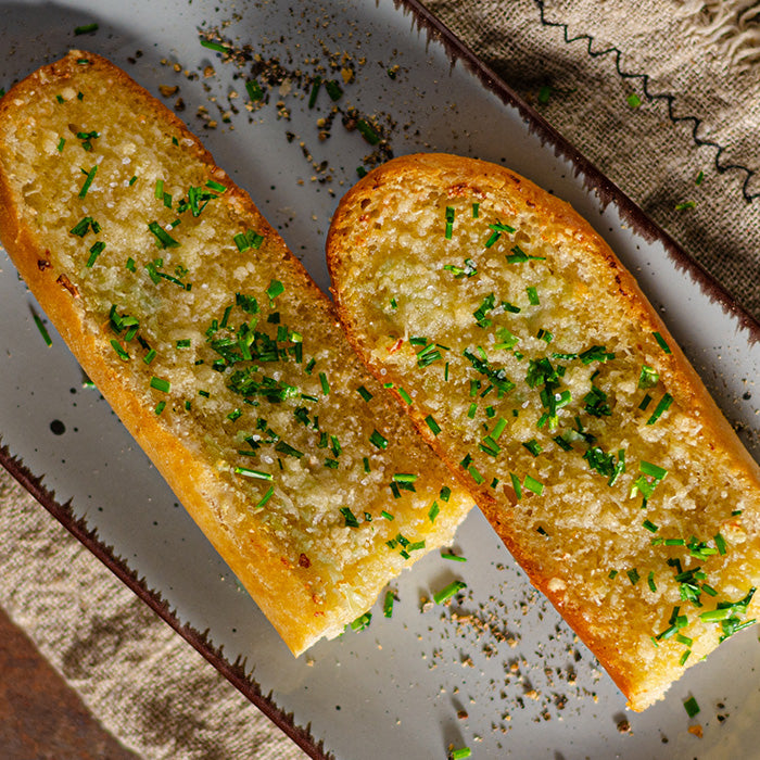 Cheesy Garlic Bread - What a Crock delivers easy, prepared slow cooker & crockpot meals nationwide. America's easiest meal kit company. Boil in bag and instant pot dinners available.